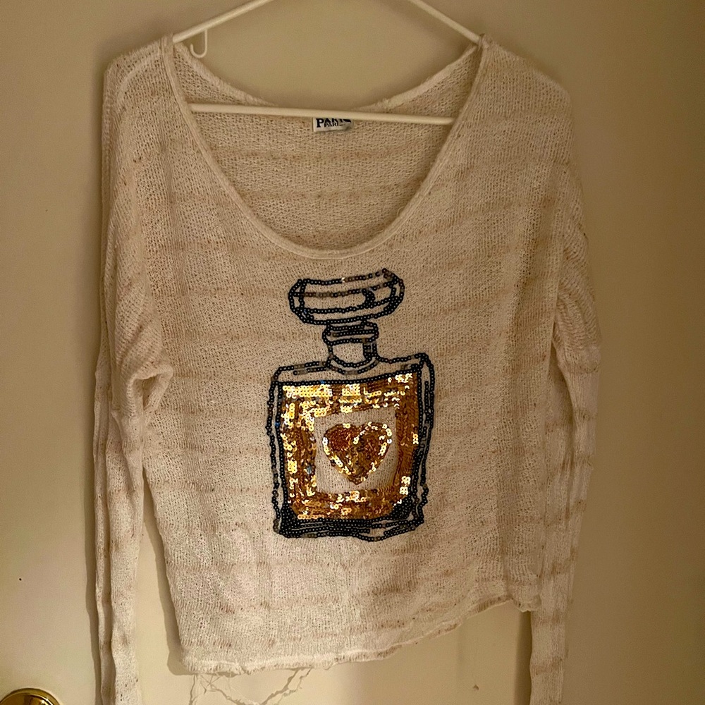 Paris Paris shirt, size medium. The shirt has a little unraveling on the bottom